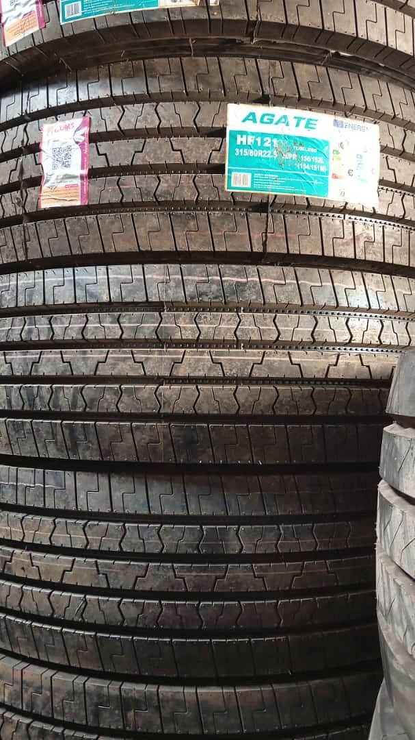photo_2025-11-24_10-59-11 لاستیک سایز 315/80R22.5 برند اگیت گل جلو، مناسب محور فرمان کامیون و تریلی، با آج عمیق و طراحی ضدلغزش